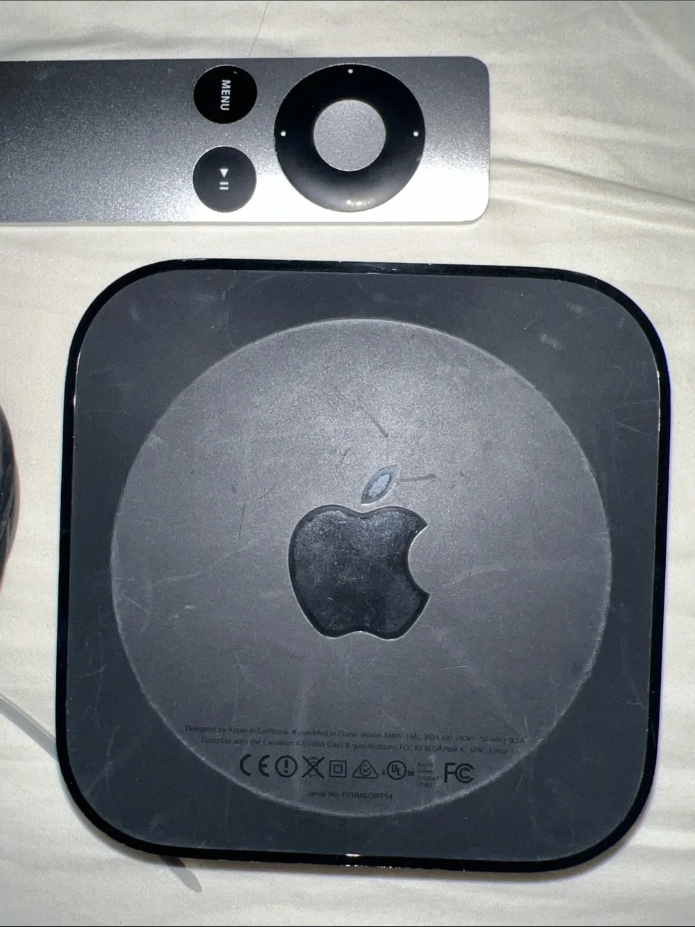 3rd Generation Apple TV factory reset with original silver remote and cable